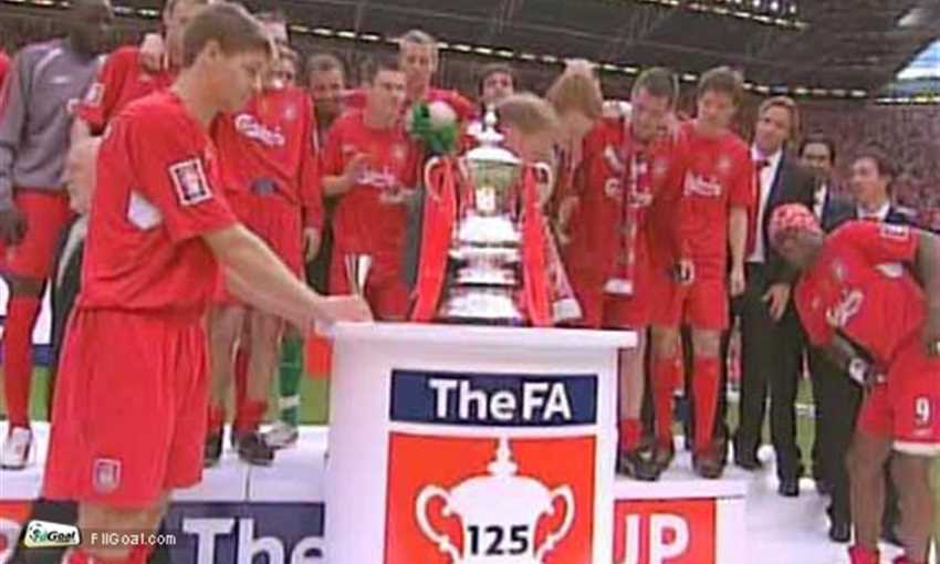 Liverpool players celebrate the FA Cup.