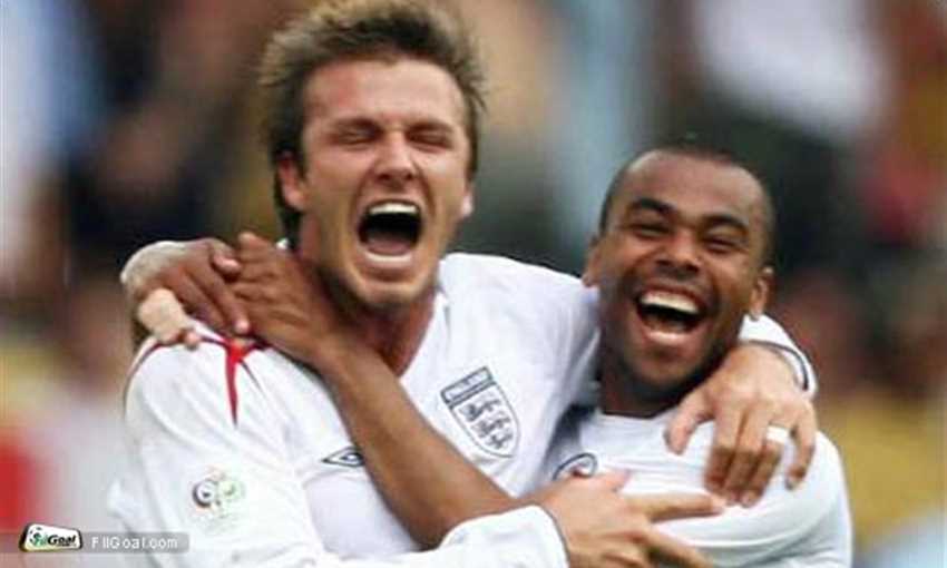 Cole (R) with David Beckham - file photo
