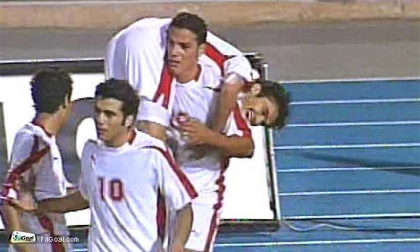 Egypt players celebrating a goal against Uganda