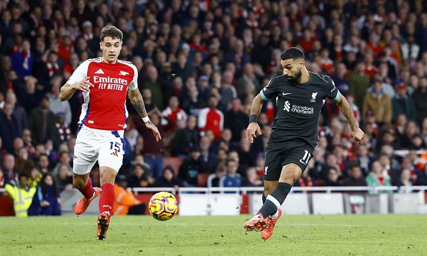 Mohamed Salah Shines as Liverpool Draws 2-2 with Arsenal: Coach Arnie Slot Praises Star’s Impact and Historic Goalscoring Feat